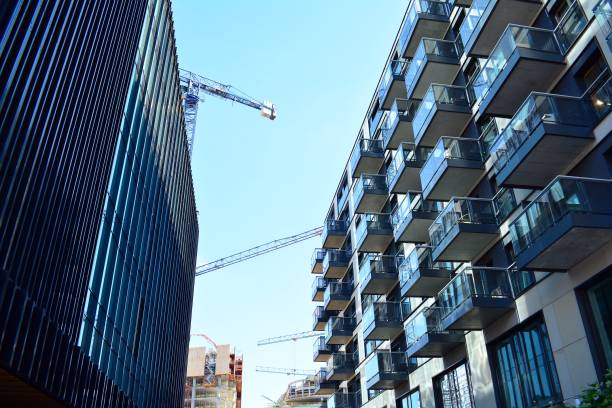 istock Brand new apartment building on sunny day 993966126