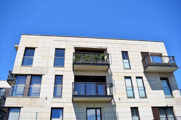 istock Brand new apartment building on sunny day 993966782