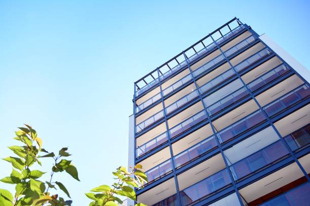 istock Brand new apartment building on sunny day 993966800