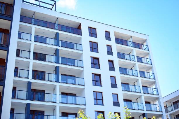 istock Brand new apartment building on sunny day 993967500