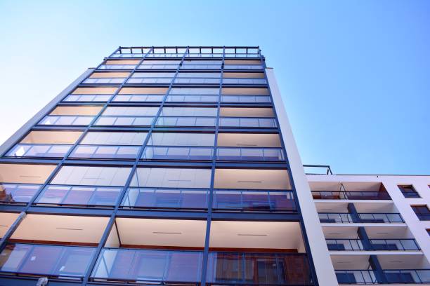 istock Brand new apartment building on sunny day 993967690