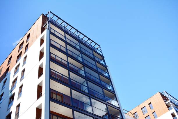 istock Brand new apartment building on sunny day 993967764