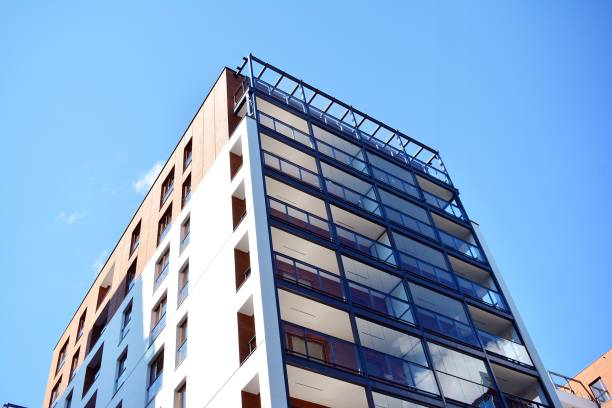 istock Brand new apartment building on sunny day 993967766