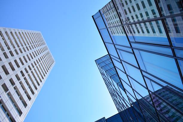 istock Blue clean glass wall of modern skyscraper 993967788