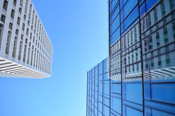 istock Blue clean glass wall of modern skyscraper 993967802