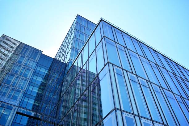 istock Blue clean glass wall of modern skyscraper 993967804