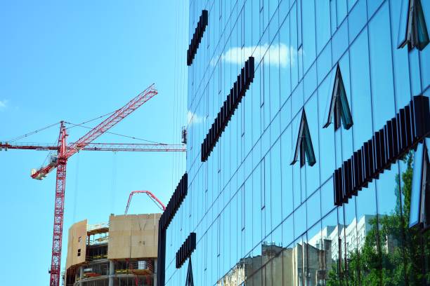 istock Blue clean glass wall of modern skyscraper 993967810