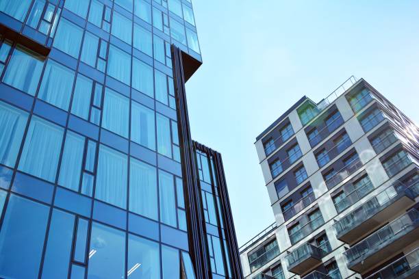 istock Blue clean glass wall of modern skyscraper 993967814