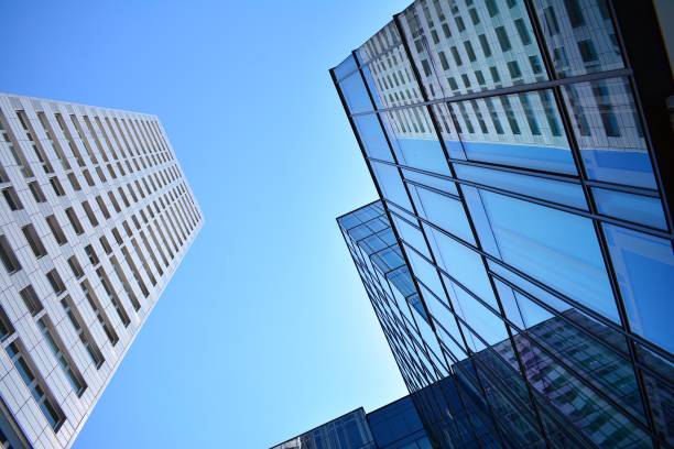istock Blue clean glass wall of modern skyscraper 993968078
