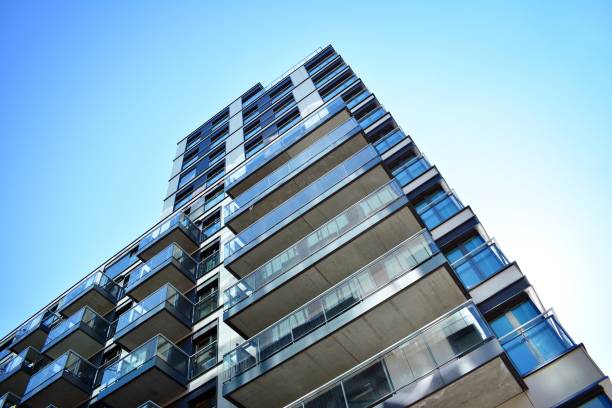 istock Brand new apartment building on sunny day 993968118