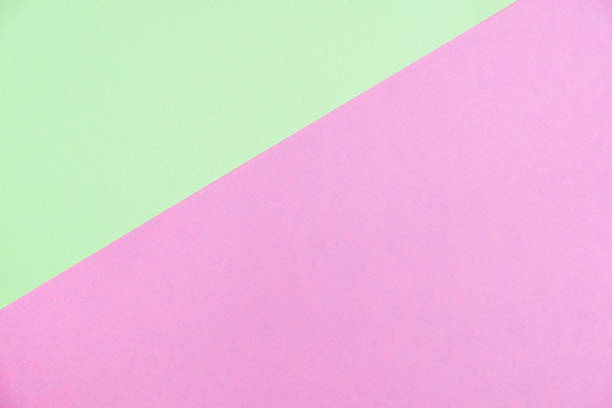 istock Pastel colored paper flat lay top view, background texture, green and pink 993969866