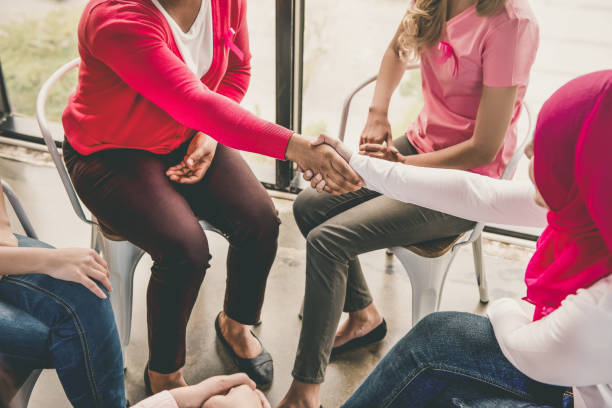 istock Women making handshake greeting each other in group meeting 993970000
