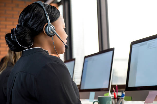 istock Businesswoman working in call center 993970204