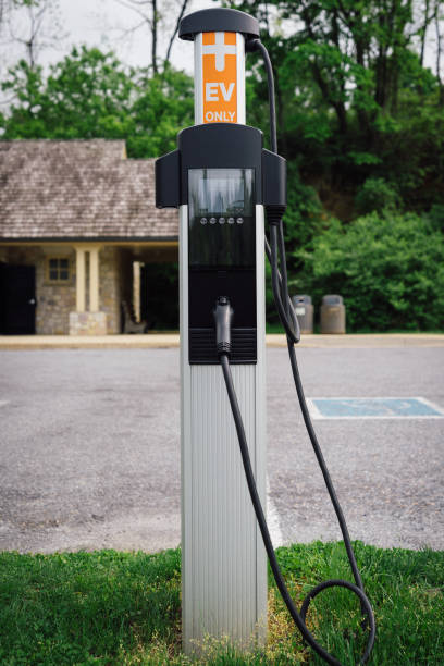 istock Electric car charging station pump 993978174