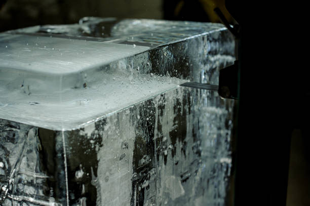 istock Special tool cutting a big ice cube on the plant 993980980