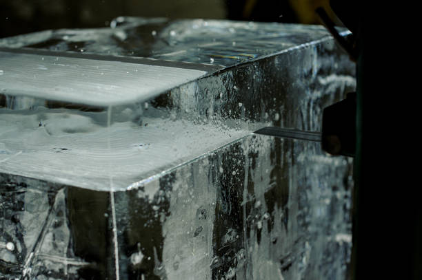 istock Special tool cutting the big ice cube on the plant 993981650