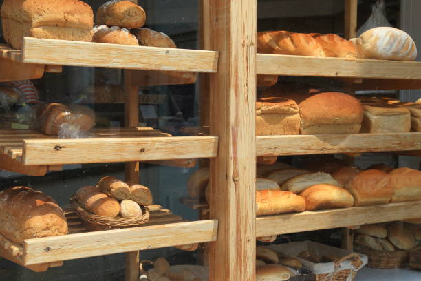 istock Shelves filled with freshly baked loaves 993982692
