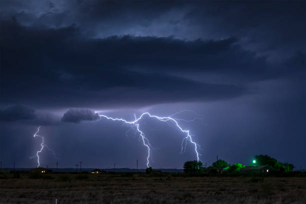 istock Lightning storm over field in Oklahoma 993982808