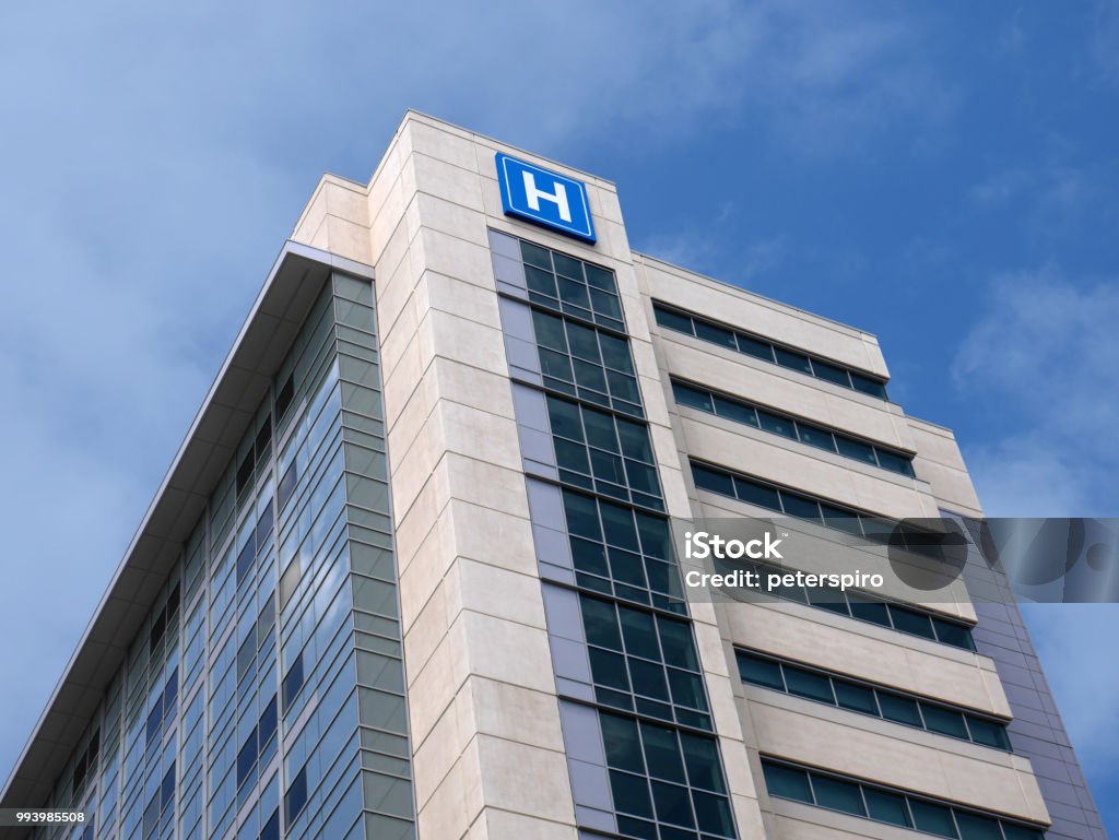 Building with large H sign for hospital Hospital Stock Photo