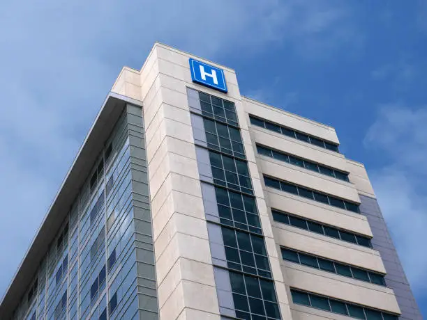 Building with large H sign for hospital