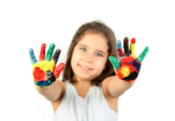 istock Cute girl with painted hands 994044998