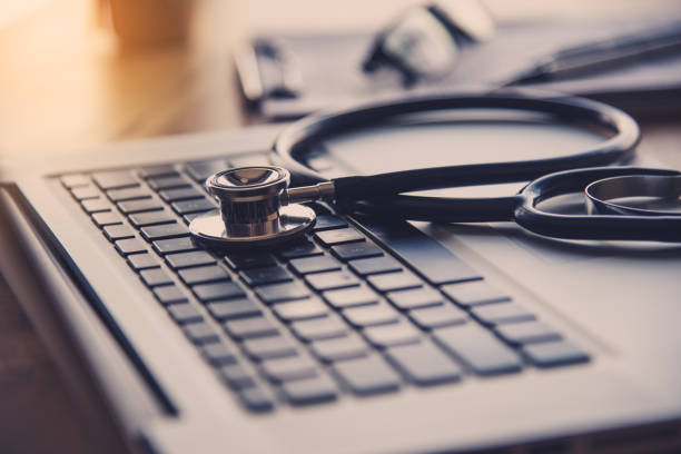 istock stethoscope on the keyboard of laptop 994060992