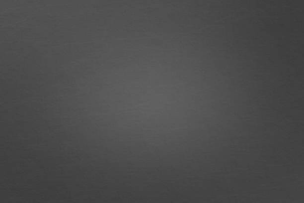 istock Black recycled paper texture, abstract background 994072534