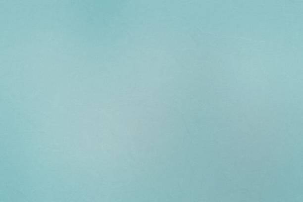 istock Light green recycled paper texture, abstract background 994072570