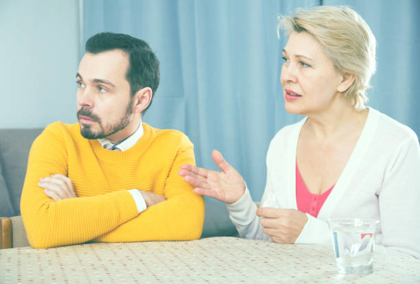 istock Mature mother and son quarrel 994112492
