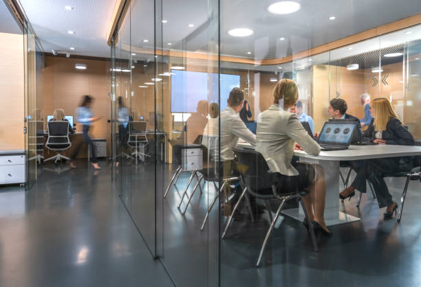 istock Business people having meeting in conference room 994118974