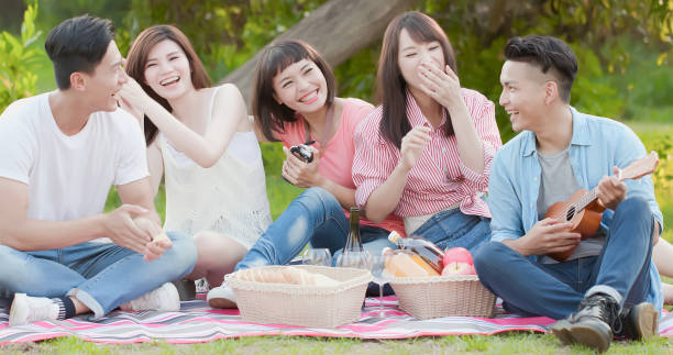 istock friends happy at a picnic 994122310