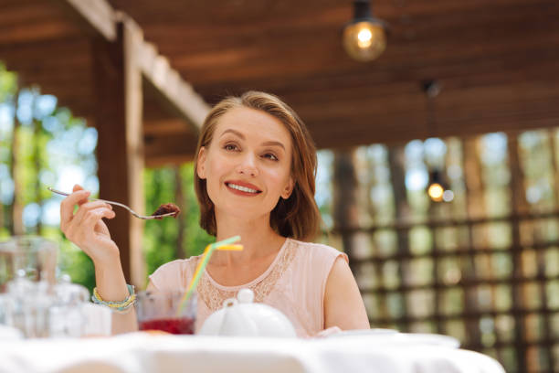 istock Smiling blonde-haired woman celebrating her birthday 994128708