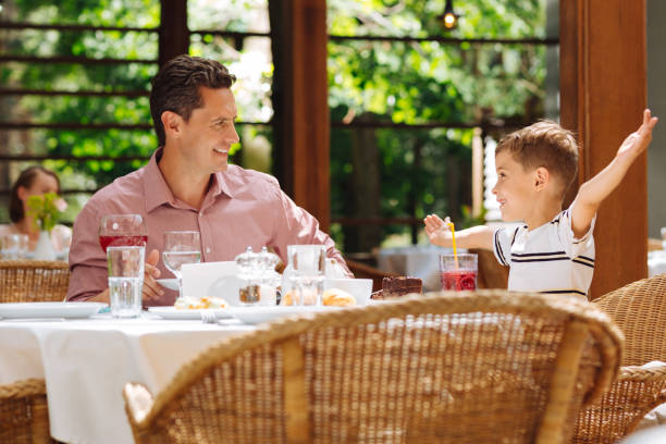 istock Little emotional boy speaking with his handsome father 994128898