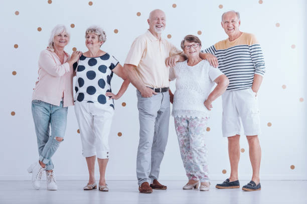 istock Group of enthusiastic senior people. Friendly relationship between elderly people 994129290
