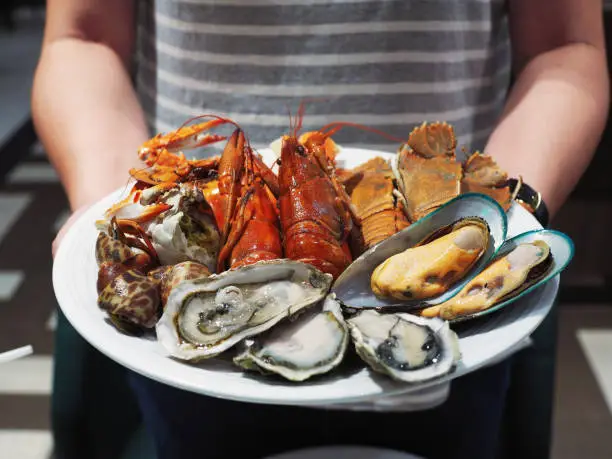 Photo of Plate of steamed crayfish, giant river prawn, mussel, giant crab and fresh oyster.