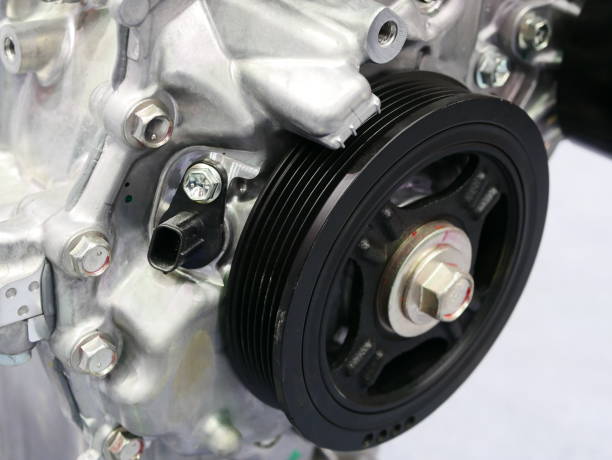 istock Pulleys of car engine mechanism 994140650