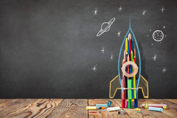 istock Back to School Concept with Hand Drawn Rocket on Blackboard 994147686