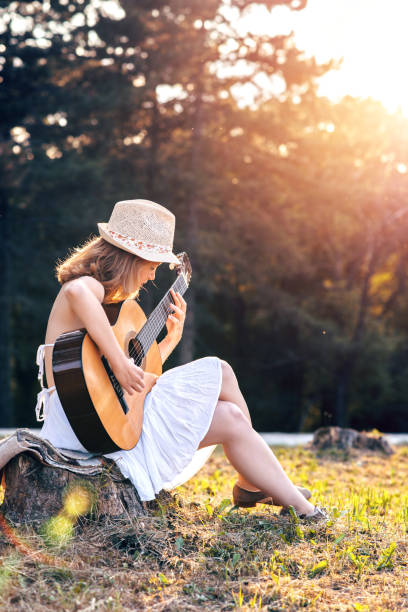 istock Girl playing guitar 994148730