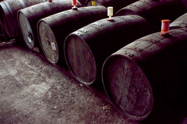 istock Cider barrels in cider production farm basement 994151514