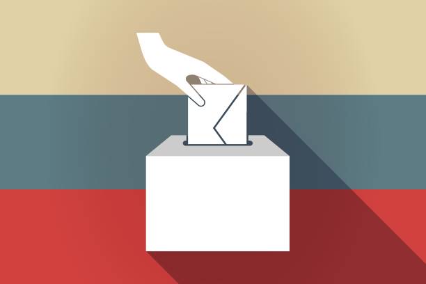 istock ong shadow Russia flag with  a hand inserting an envelope in a ballot box 994159002