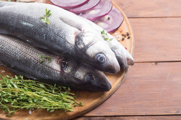 istock Raw sea bass fish 994160248