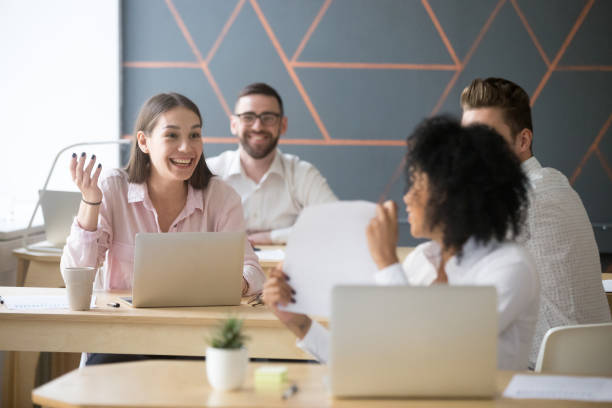 istock Satisfied black worker praising good results with colleagues in office 994164898