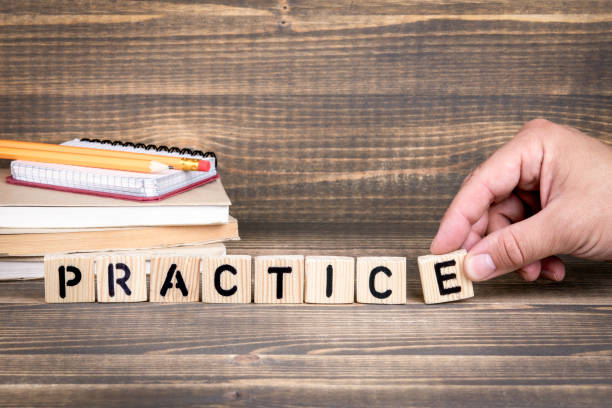 istock practice. Wooden letters on the office desk 994167692