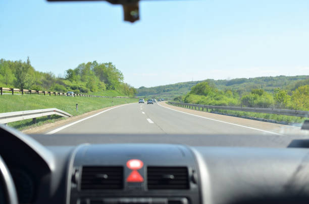 istock Driving a car on a highway 994167886