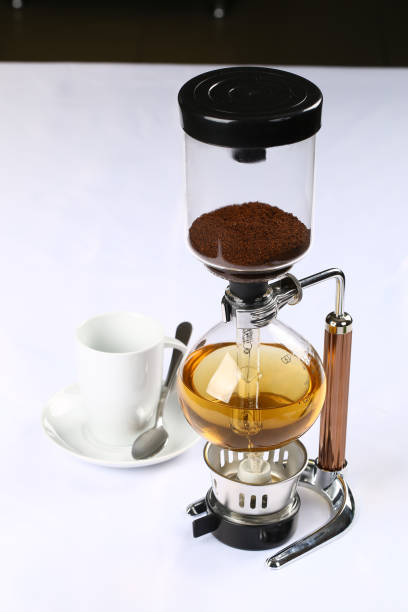 istock Syphon coffee maker - Barista makes siphon coffee 994168268