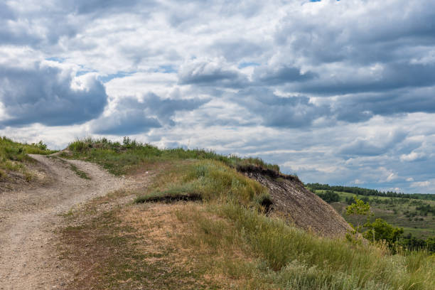 istock Idyllic landscape - a path in the hills 994176530