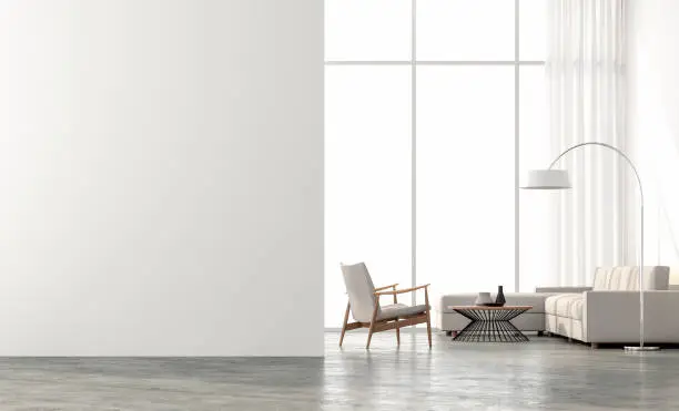 Minimal style  living room 3d render.There are concrete floor,white wall.Finished with beige color furniture,The room has large windows. Looking out to see the scenery outside.