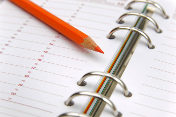 open calendar with red pencil and ready for your date