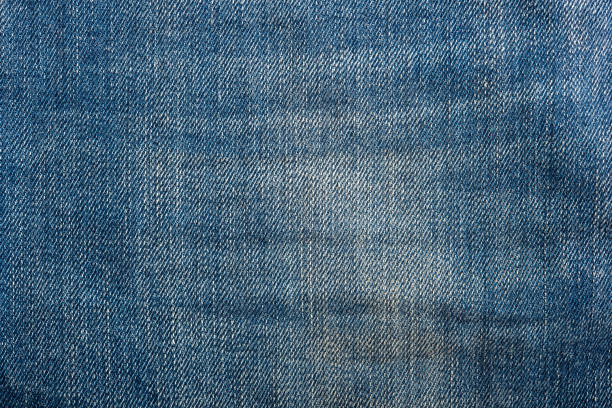 istock Blue denim jean texture and seamless background 994230996