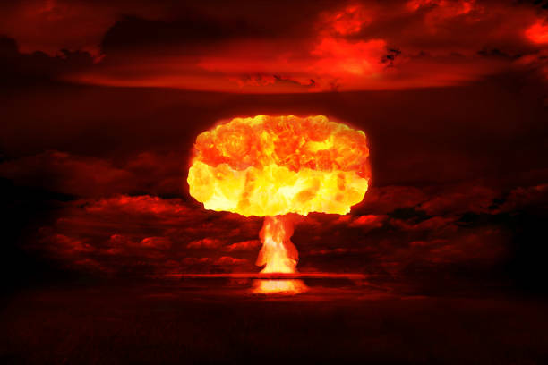 istock Atomic bomb realistic explosion, red color with smoke on black background 994238408